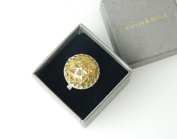 Large domed triangle ring